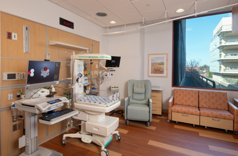 Stanford Children's NICU patient room filled with NICU equipment.