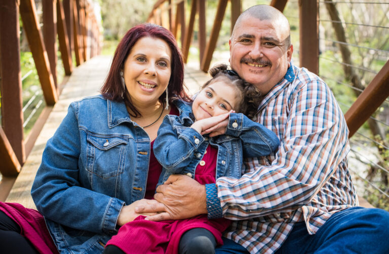 Young cancer patient with parents