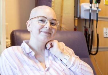 23-year-old cancer patient smiles to camera
