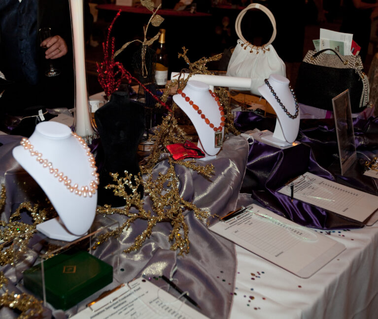 Jewelry is displayed on a table.