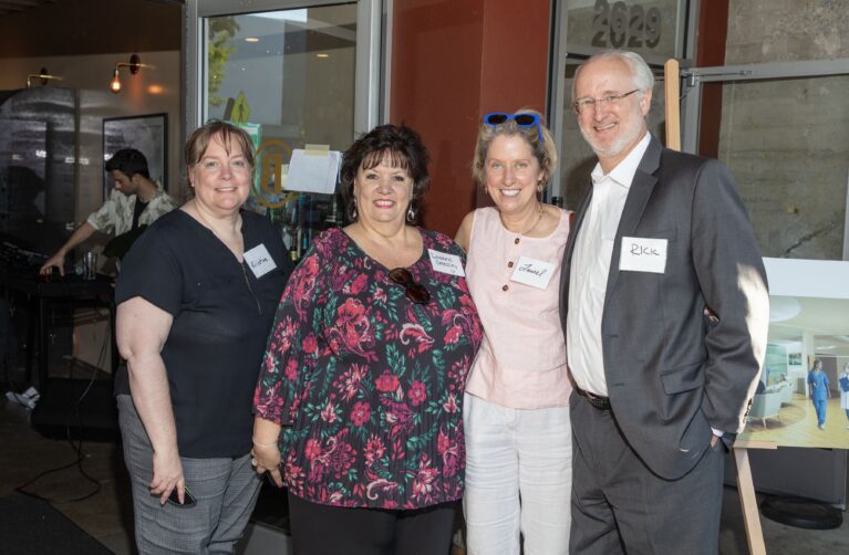 Donor Laurel Lagenaur posing with friends at an event