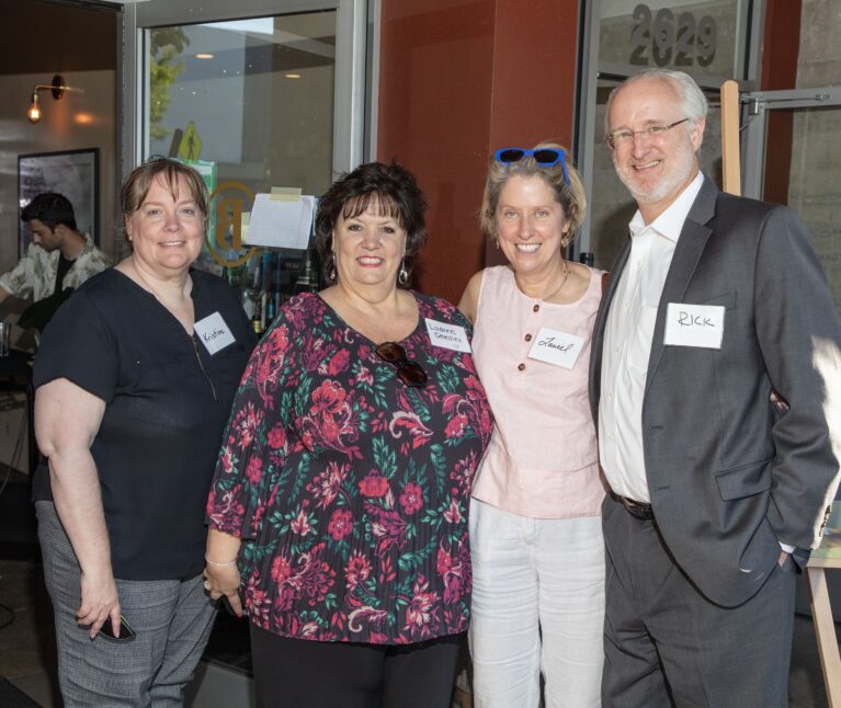 Donor Laurel Lagenaur posing with friends at an event