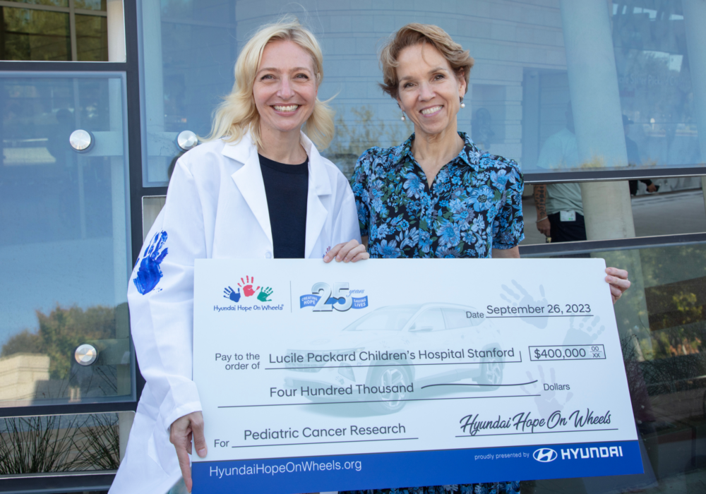 Physician-scientists accepting donations from Hyundai Hope On Wheels.
