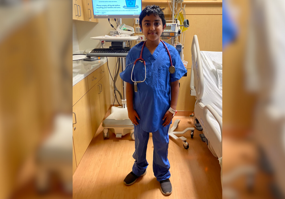 Anuj in doctor uniform.