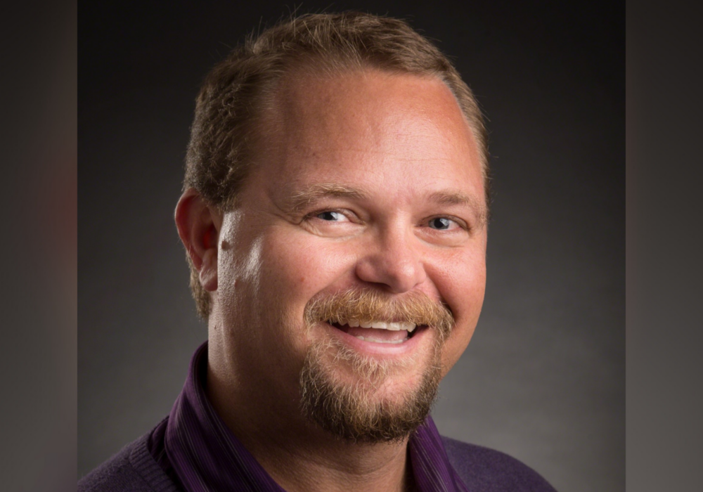Headshot of Justin Baker.