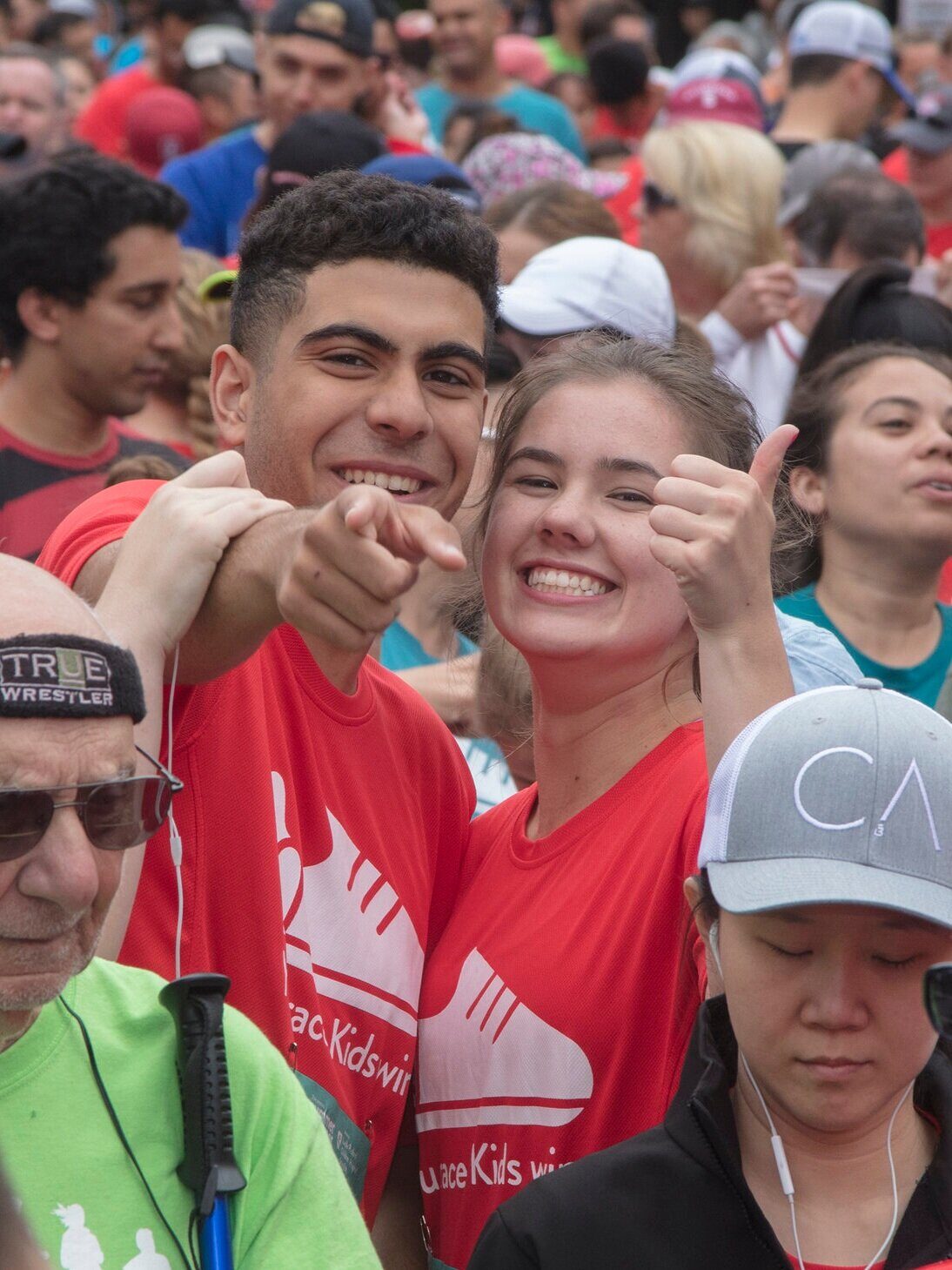 Two adult Summer Scamper participants smiling at camera.