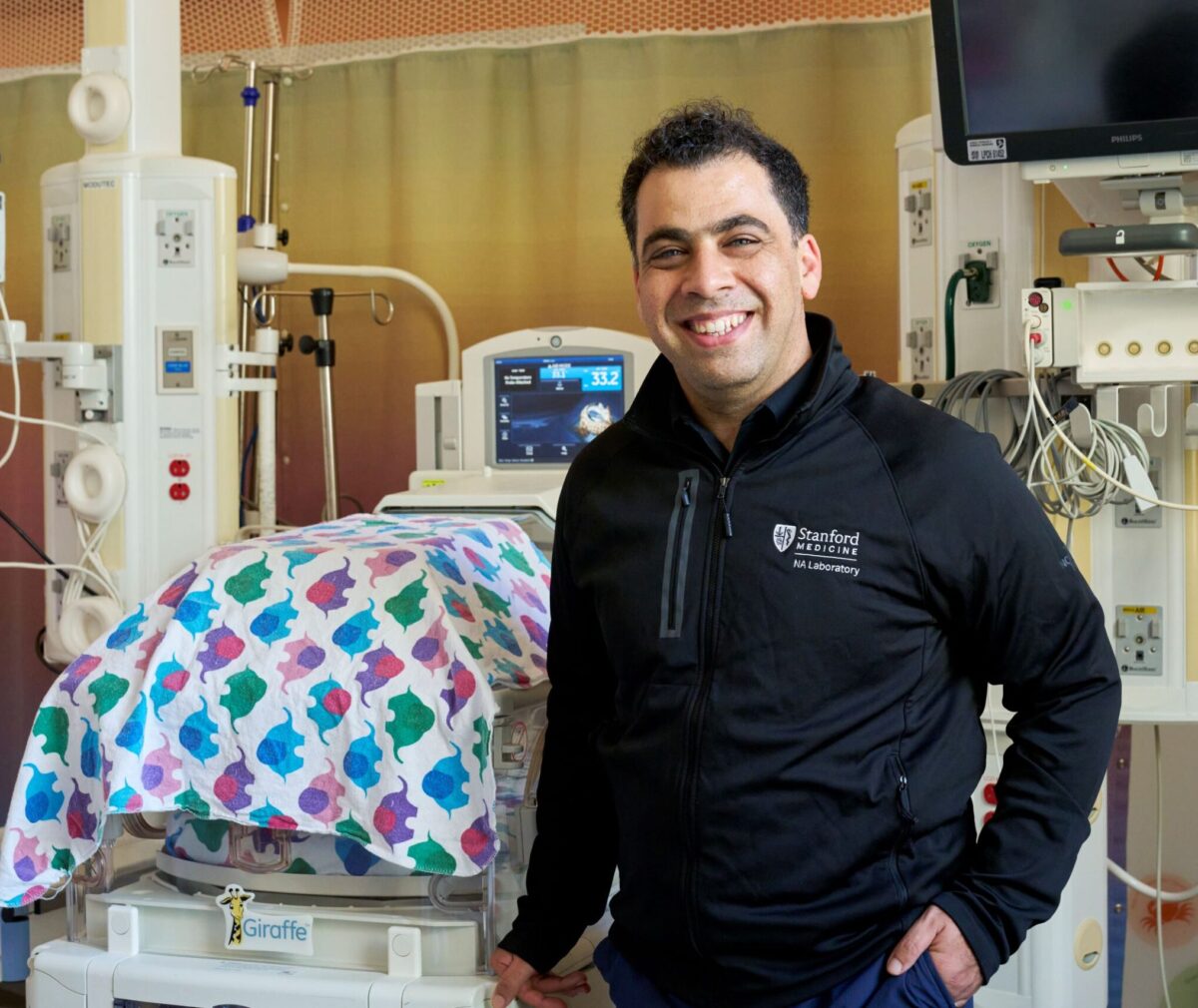 Nima Aghaeepour, PhD in hospital delivery room.