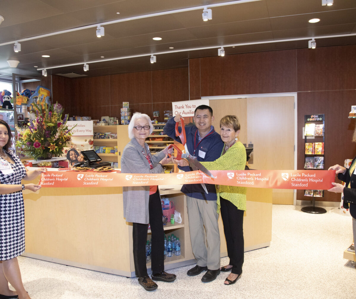 Pictured: Auxiliary in the ribbon cutting ceremony for the Gift Shop in the New Hospital. Pictured featured in FY2018 Report on Giving in 19PCN1