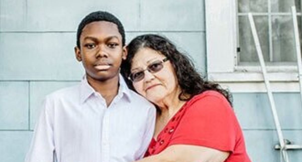 Woman hugging boy