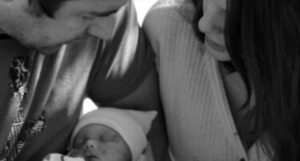 Parents looking at baby