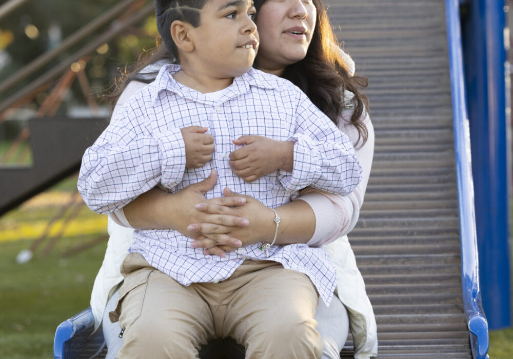 Aiden with his mother.