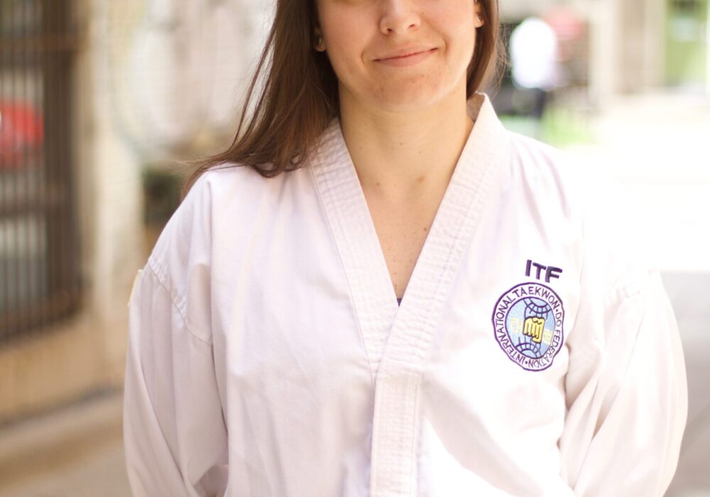 Dr Dessi Zaharieva posting in her Taekwondo outfit, called a dobok.