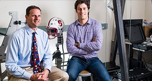 Paul Fisher and David Camarillo posing together in a lab