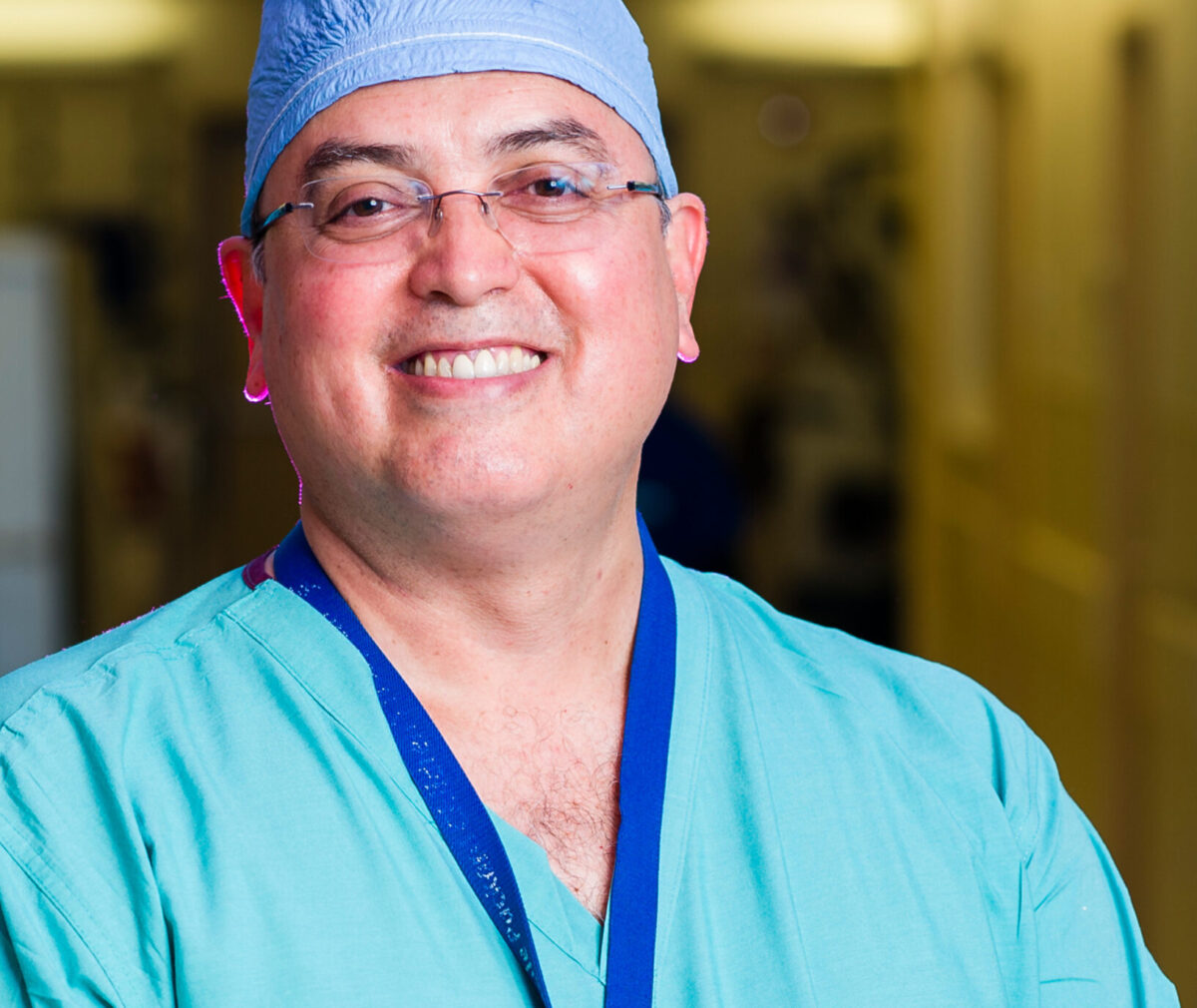 Headshot of Dr Waldo Concepcion wearing his scrubs.
