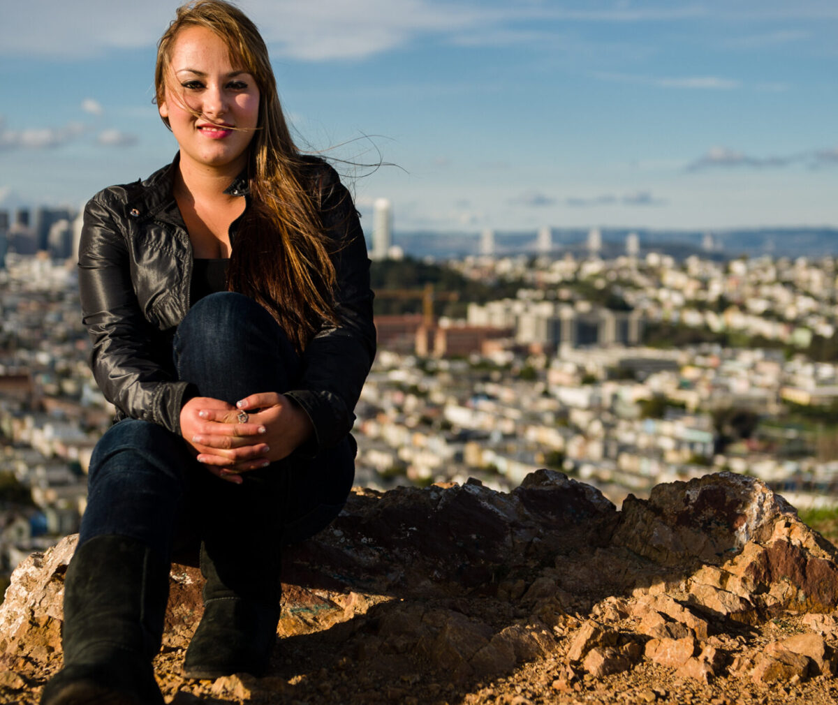 Jeremiah Kwakye stands on a hill overlooking San Francisco.