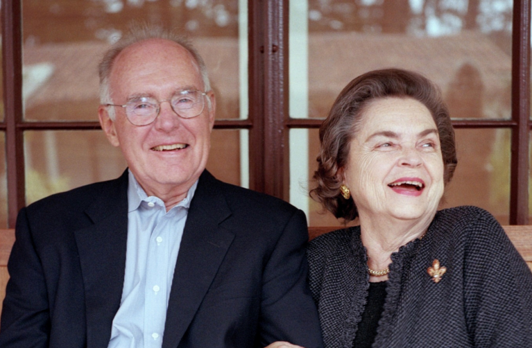 Betty and Gordon Moore sitting next to each other.