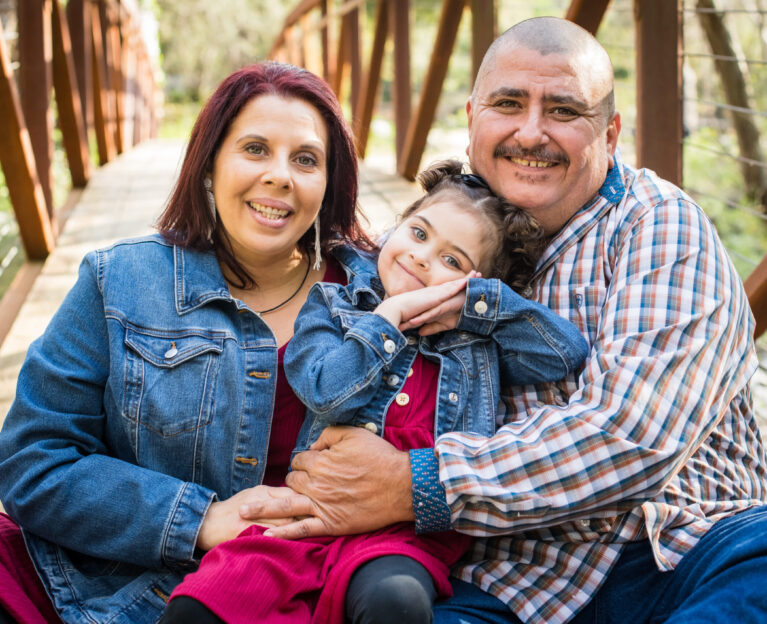 Young cancer patient with parents