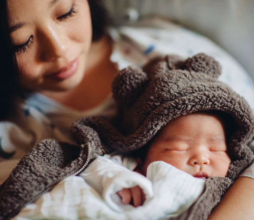 Mother holding newborn baby