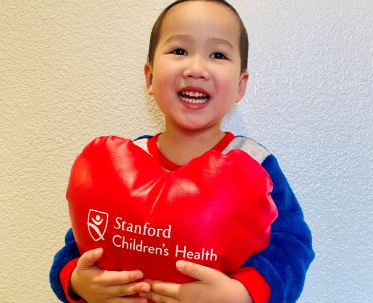 A young heart patient smiling